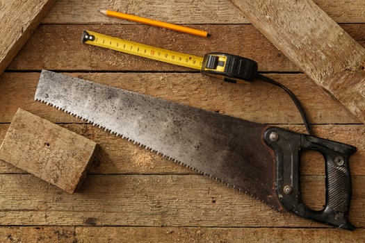 Carpentry tools on wooden surface photo