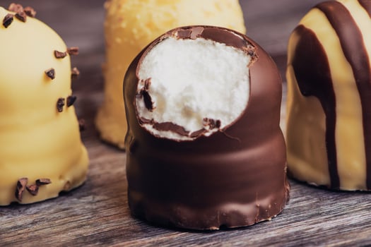 white and dark chocolate covered marshmallows photo