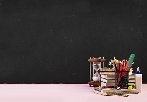 Set of colorful school supplies, books and notebooks. Stationery accessories. photo