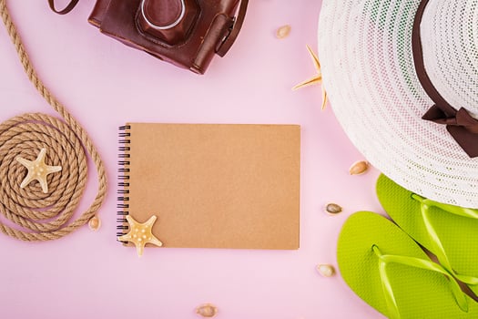 Vacation concept. Colorful female vacation accessories. Summer flat lay. Top view photo