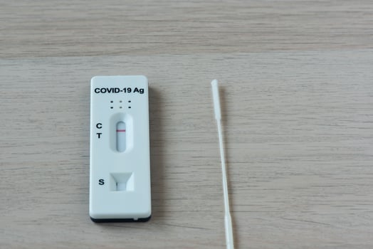 Rapid antigen test kit and nasal swab photo