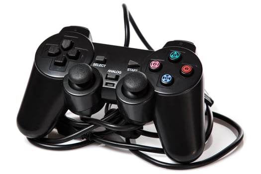 Black gamepad on white background photo