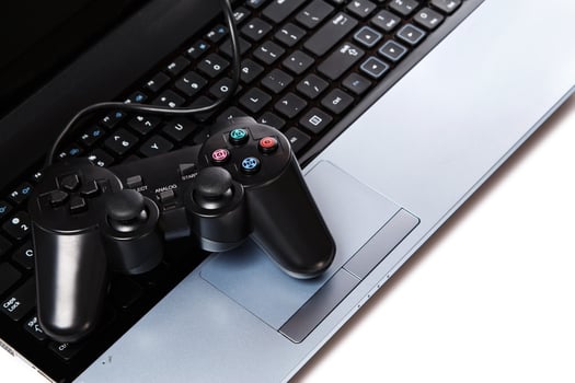 Gamepad is lying on a keyboard photo