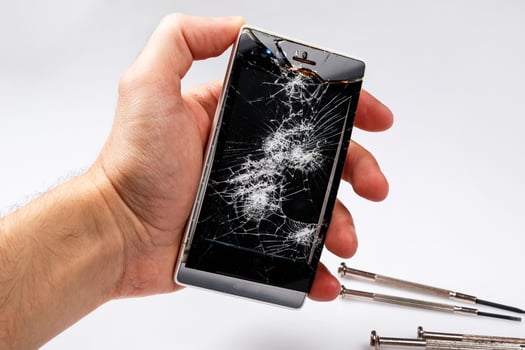 Smartphone with cracked display photo