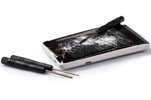 Smartphone with cracked display photo