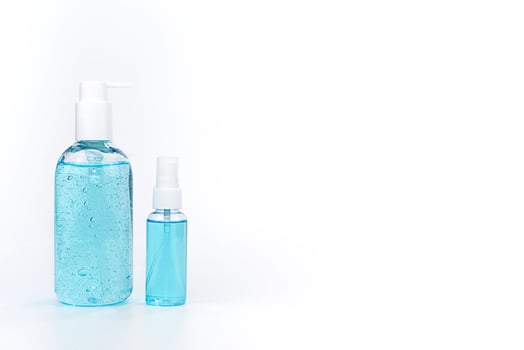 Alcohol gel and spray alcohol on white background photo