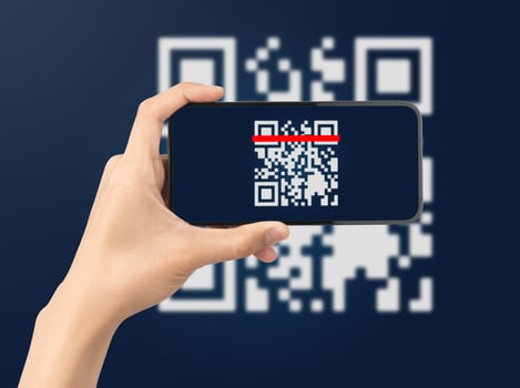 Hand using mobile smart phone scan Qr code. Barcode reader, Qr code payment, Cashless technology, Digital money concept photo