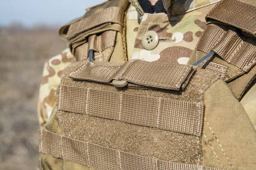 Close up of army uniform on the soldier photo