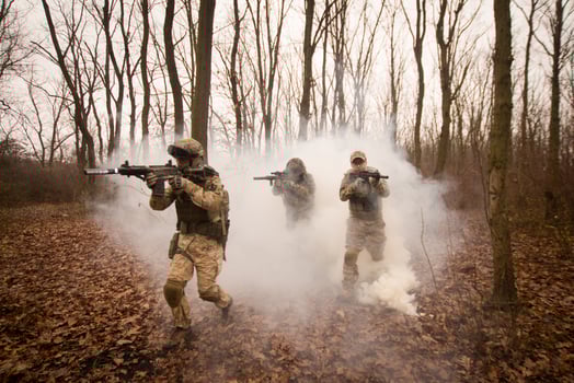 soldiers in the autumn forest photo