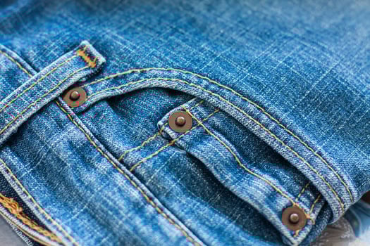 Close up of blue jeans photo