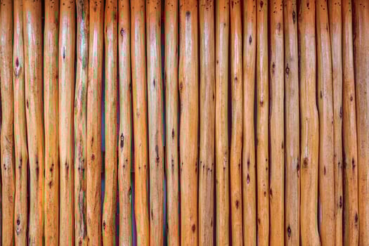 Brown old striped hardwood plank fence background photo