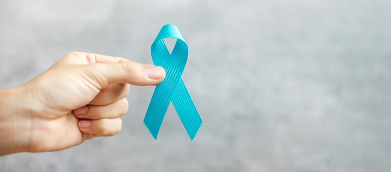 November Prostate Cancer Awareness month, man holding light Blue Ribbon for supporting people living and illness. Healthcare, International men, Father, World cancer day and world diabetes day concept photo