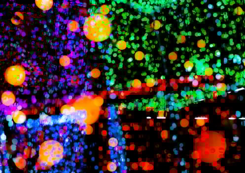 Christmas and happy new year decoration light. Colorful bokeh background with beautiful pattern. Defocused Xmas light in the night of party. Christmas holiday bokeh background. Illumination garland. photo