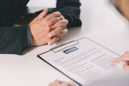 Close up diverse businessman hands talking at meeting. Client making deal with professional manager at negotiate in office. Successful man concludes agreement with lawyer. photo