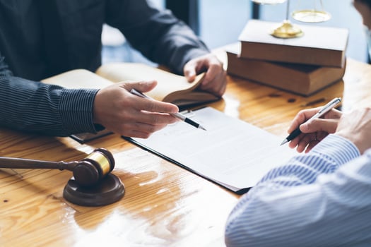 Male lawyer or judge consult having team meeting with client, Law and Legal services concept. photo