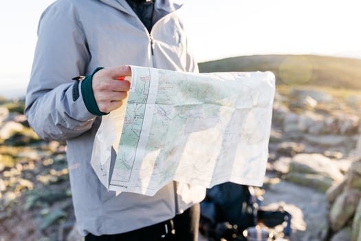 Person looking at a map photo