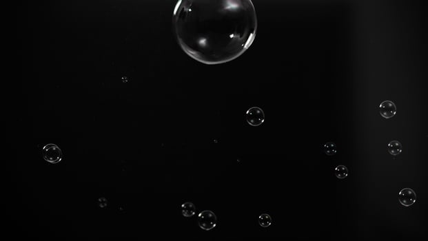 Soap bubble drop or Shampoo bubbles floating like flying in the air photo