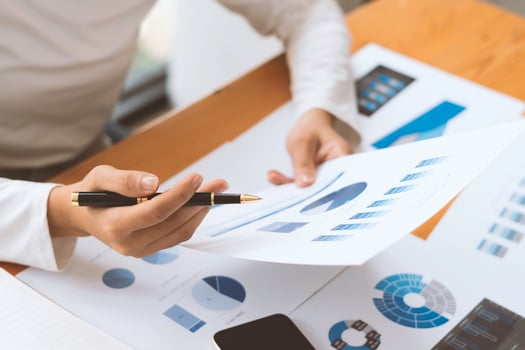strategy analysis concept, Businessman working financial Manager Researching Process accounting calculate analyse market graph data stock information review on the table in office. photo