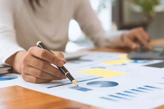 strategy analysis concept, Businessman working financial Manager Researching Process accounting calculate analyse market graph data stock information review on the table in office. photo