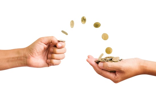 Hand flip a coins to palm of hands photo