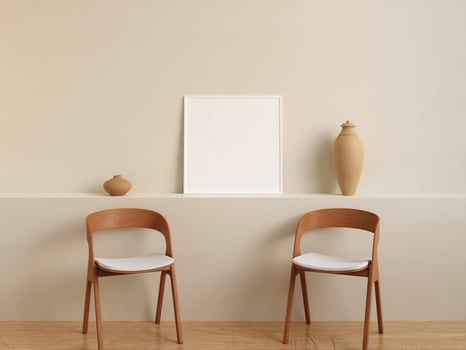 Modern and minimalist square white poster or photo frame mockup on the wall in the living room. 3d rendering.