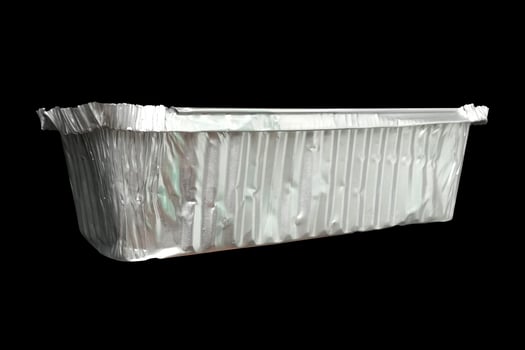 foil packaging boxes For putting food on the black background. photo