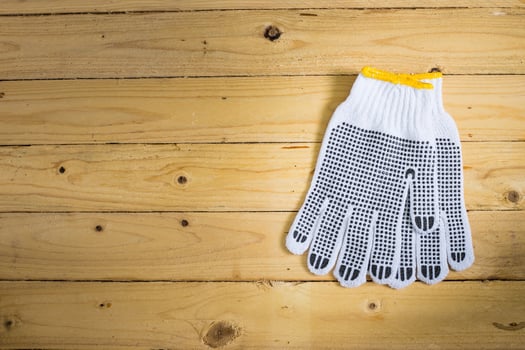 Gloves on wooden background photo