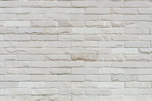 Abstract weathered texture stained old stucco light gray and aged paint white brick wall background photo