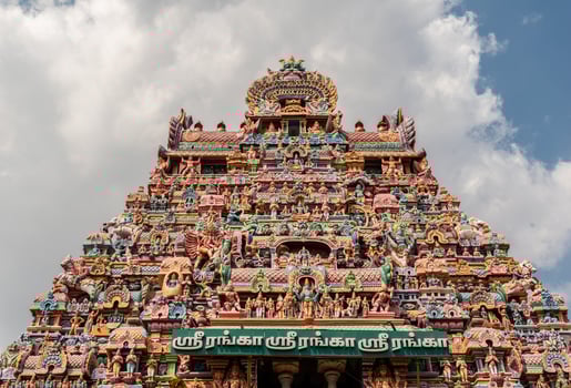 The tower spire of the ancient Hindu temple of Srirangam near Tiruchirapalli in South India photo