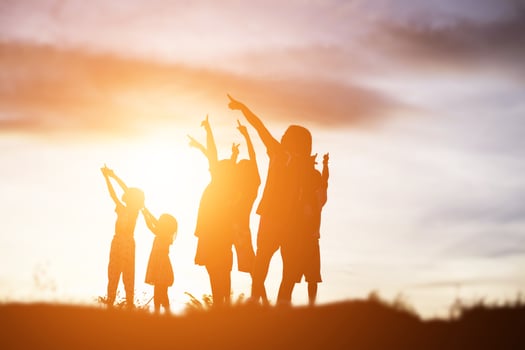 silhouette of a happy children and happy time sunset photo