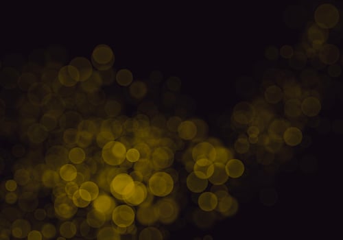 Golden yellow bokeh background  There is a sparkle of lights, Christmas and New Year party ideas. photo