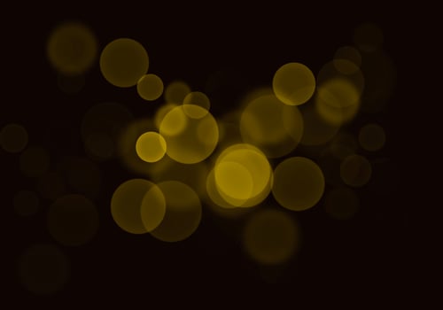 Golden yellow bokeh background  There is a sparkle of lights, Christmas and New Year party ideas. photo