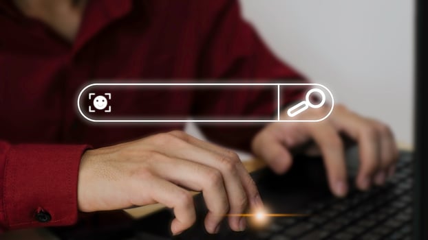 Data Search Technology Search Engine Optimization The human hand is using a computer keyboard to find information using Search Console with your website. photo