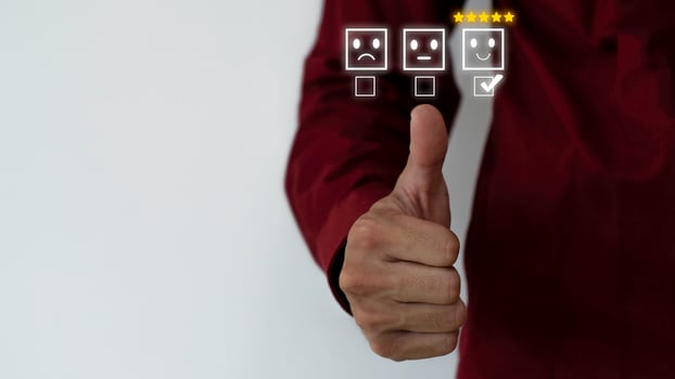 Close up on Customer Man Hand pressed on smartphone screen with top level feedback icon for best rating on business idea service review. photo