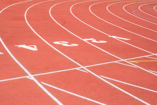All-weather running track , orange and white lanes for running training photo