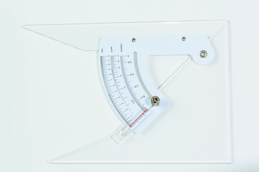 The drafting supplies on a white background. photo