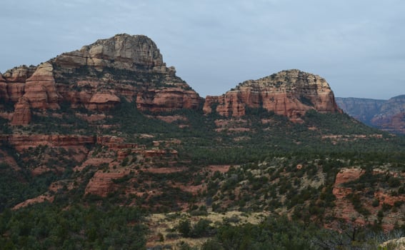 Stunning Landscape with Red Rock Towering in the Background photo