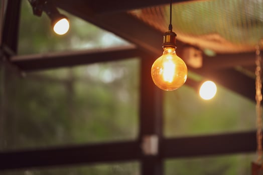 Decorative lamps in the cafe give a warm feeling. coffee shop decoration ideas photo