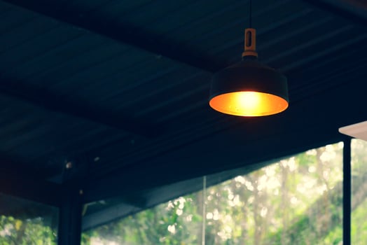 Decorative lamps in the cafe give a warm feeling. coffee shop decoration ideas photo