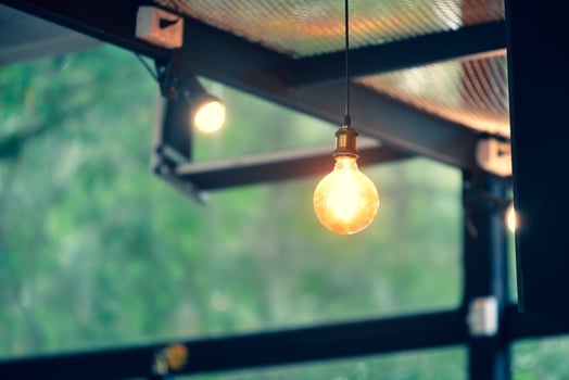 Decorative lamps in the cafe give a warm feeling. coffee shop decoration ideas photo