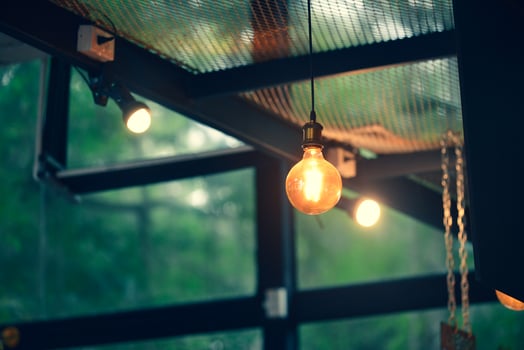 Decorative lamps in the cafe give a warm feeling. coffee shop decoration ideas photo
