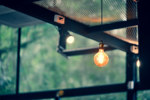 Decorative lamps in the cafe give a warm feeling. coffee shop decoration ideas photo