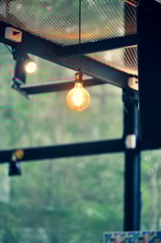 Decorative lamps in the cafe give a warm feeling. coffee shop decoration ideas photo