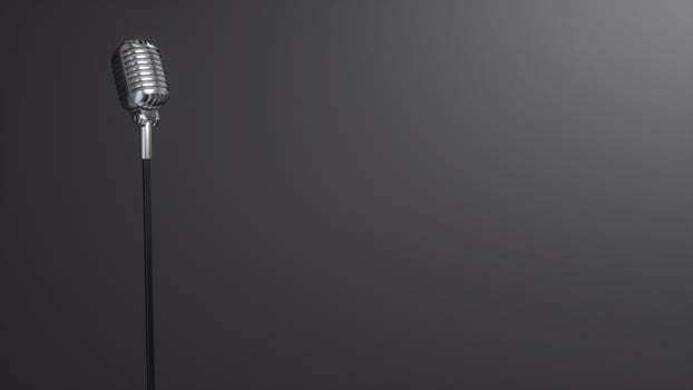 Silver retro microphone on black background photo