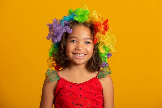 beautiful happy child dressed for carnival party photo