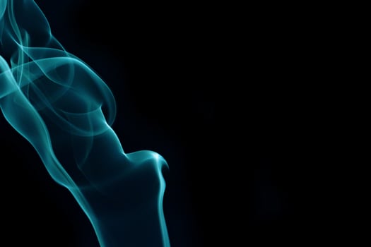Green smoke on black background photo