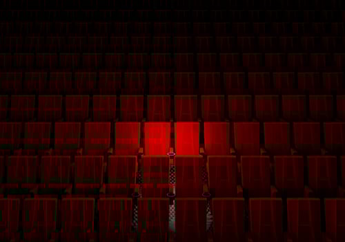Rows of red velvet seats watching movies in the cinema with spotlight only couple deluxe seat background. Entertainment and Theater concept. 3D illustration rendering photo