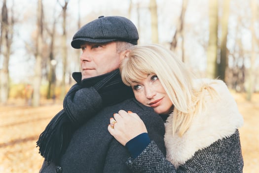 Happy blonde mature woman and handsome middle-aged brunette man photo