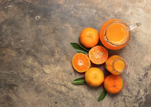 Top view of orange juice on cement floor photo