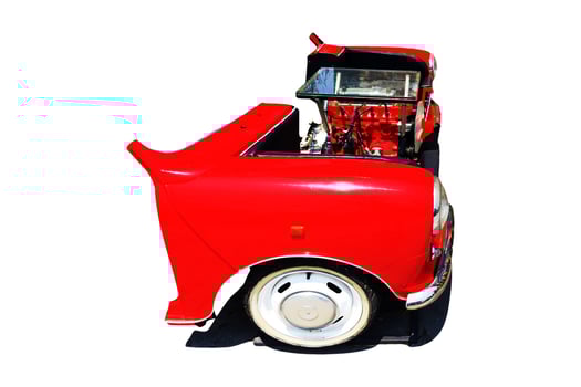 Red sofa set made from cars on white background. photo